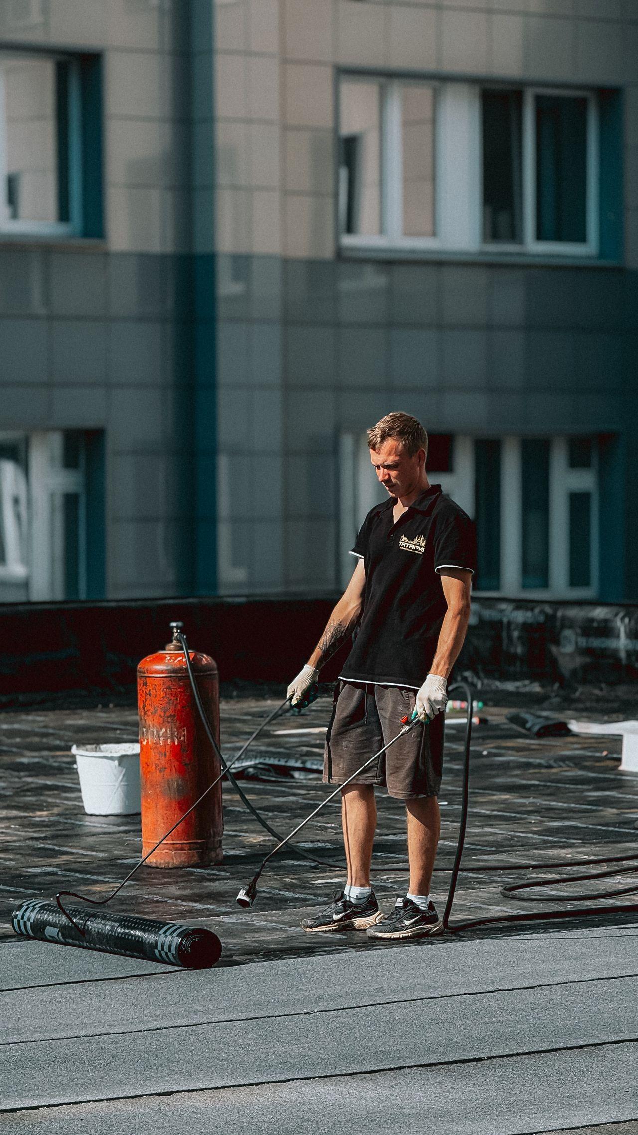 Professional roofing team working on a roof